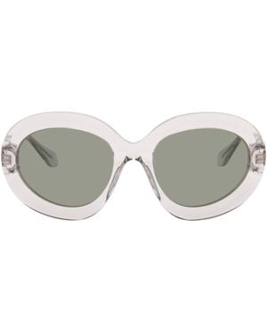 Alaïa Round Wraparound Sunglasses - Grey