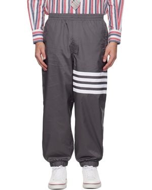 Thom Browne Pantalon De Survêtement Gris En Tissu Antidéchirures Lustré À Quatre Rayures - Noir