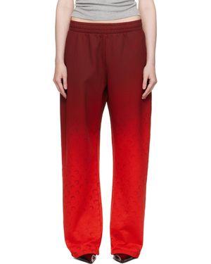 Marine Serre Pantalon De Survêtement Rouge En Jersey Bouclette À Effet Délavé Et À Motif À Logos