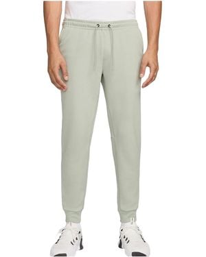 Nike Primary Dri-Fit Uv Versatile Jogger Trousers "Jade Horizon" Fz0975 370" - Black