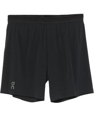 On Shoes 7" Performance Shorts 1Mf10100553" - Black