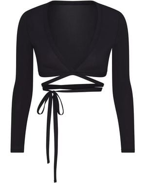 Skims Weightless Layers Wrap Top "Nike - Black