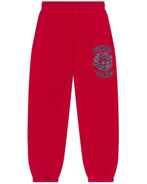 DENIM TEARS Denim University Joggers Dt644" - Red