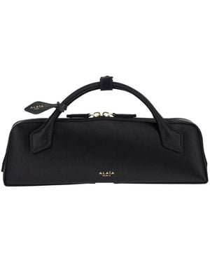 Alaïa Clutch “Le Teckel” - Blue