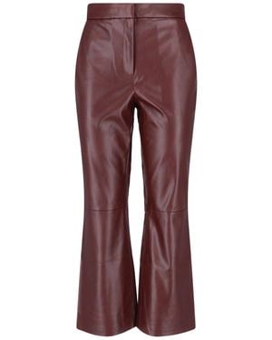 Calvin Klein High-Waisted Flared Faux Leather Trousers