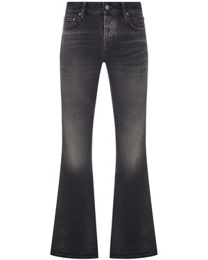 Haikure Jeans flare in denim lavato con tasche - Blu