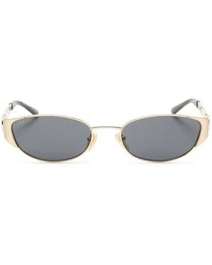 Gucci Occhiali da sole ovali in tonalita` oro - Metallizzato