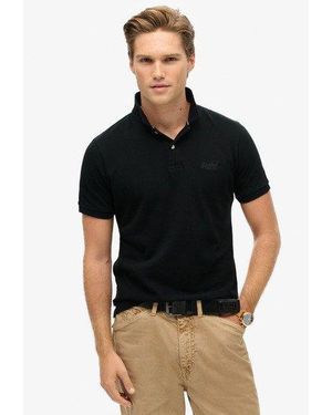 Polos Superdry pour homme Reductions en ligne jusqu a 60 Lyst