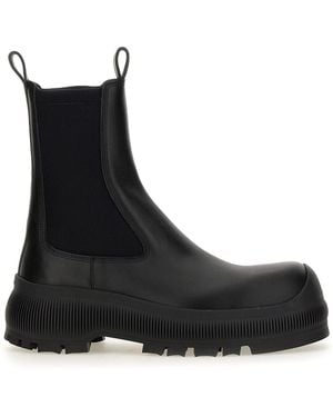 Jil Sander Slip-On Ankle Boots With Embossed Logo - Black