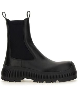 Jil Sander Slip-On Ankle Boots With Embossed Logo - Black