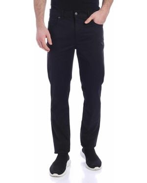 Moschino Logo Distorted Double Question Mark Jeans In - Blue