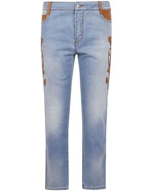 デニム・ジーパン ERMANNO SCERVINO DENIM JEANS WITH FLORAL EMBROIDERY Ermanno Scervino Boot-Cut Denim Trousers with Hand