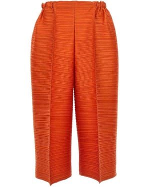 Pleats Please Issey Miyake 'Thicker Bounce' Trousers - Orange