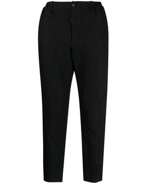 COMME DES GARÇON BLACK Chevron-Pattern Tapered Trousers - Black