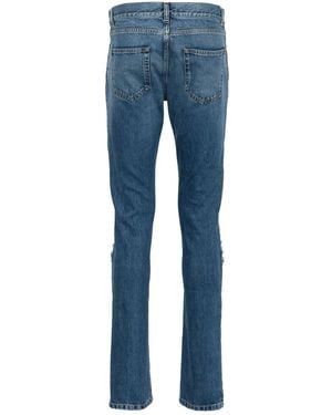 Saint Laurent Ripped-Detail Slim-Fit Jeans - Blue