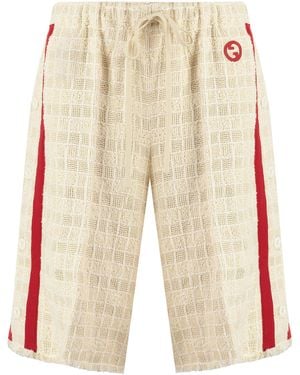 Gucci Frayed Cotton Shorts With Logo Patch And Side Slits - White