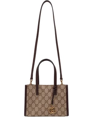 Gucci Mini tote con tracolla e motivo monogram - Marrone