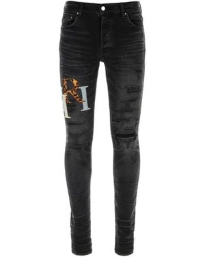 Amiri Leather Staggered Logo Ripped Jeans - Black