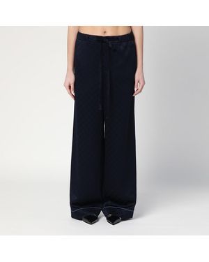 Gucci Pantalone scuro in raso con gg - Blu