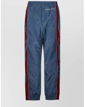 Martine Rose Stretch Pants With Stripe And Panels - Blue