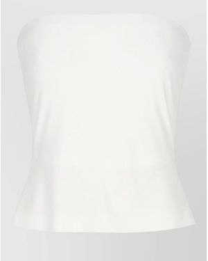 Norma Kamali Sleeveless Fitted Top Featuring Peplum Hem - White