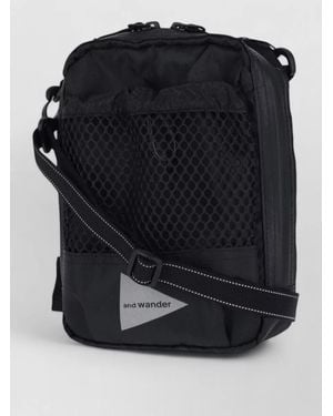 and wander Crossbody Bag Compact Design Adjustable Strap - Black