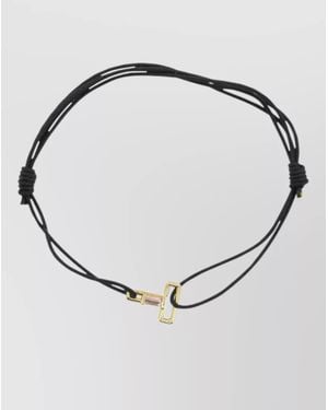 Aliita Bracelet Featuring Letter T And Charm - Multicolour