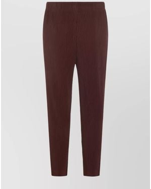 Homme Plissé Issey Miyake Trousers With Elastic Waistband And Tapered Leg - Purple