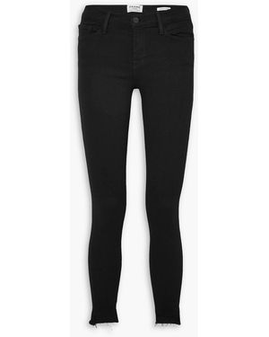 FRAME Le Skinny De Jeanne Raw stagger Mid-rise Jeans - Black