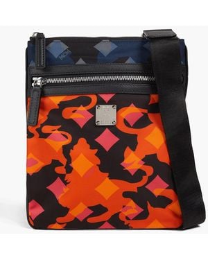MCM Dieter messenger bag aus shell mit print - Rot