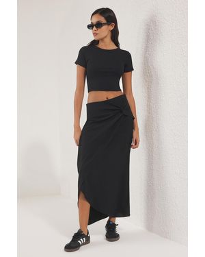 Trendyol Schwarzer Ayrobin-Knoten-Midirock Mit Details Für Damen