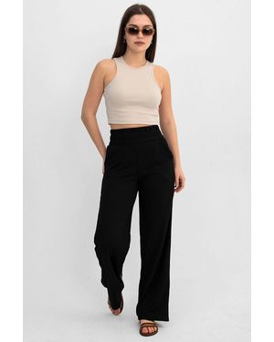 Domoda Schwarze, Faltige Hose Mit Weitem Bein Und Doppelter Tasche Und Elastischem Bund Für Damen