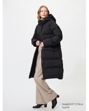 Uniqlo Abrigo Largo Plumas Sin Costuras - Negro
