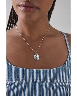 Urban Outfitters Daisy Etched Oval Locket Necklace - Blue