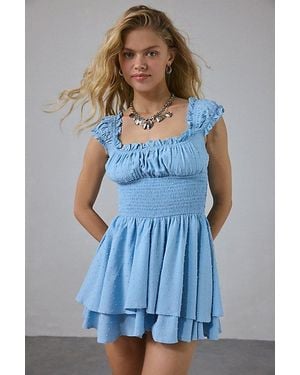 Urban Outfitters Uo Rosie Smocked Tiered Ruffle Romper - Blue