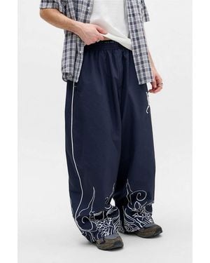 Ed Hardy Uo Exclusive Navy Print Nylon Track Trousers - Blue