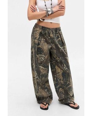 BDG Bobbi Camo Baggy Cocoon Trousers Xs At Urban Outfitters - Green