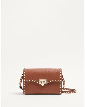 Valentino Garavani Small Rockstud Grainy Calfskin Crossbody Bag - Brown