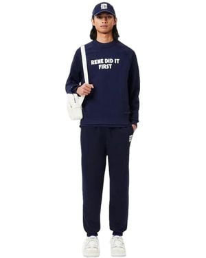Lacoste Trainingsbroek Voor Volwassenen Met De Tekst 'Rene Did It First' (Marineblauw)