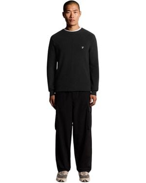 Lyle & Scott Herentrui Met Geribde Mouwen En Raglanpas Ijs) - Zwart