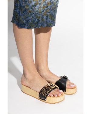 Moschino Clogs On A Wooden Platform - Blue