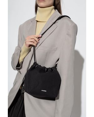 トートバッグ Jil Sander Cream fur Dumpling bucket bag Jil Sander Cream Fur Dumpling Bucket Bag in Natural | Lyst