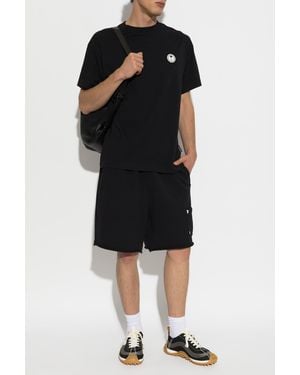 Palm Angels Cotton T-Shirt With Appliquéd Logo - Black