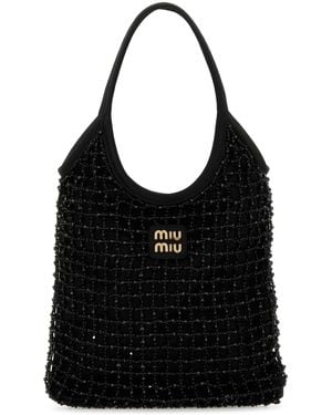 Miu Miu Handbags in Natural | Lyst