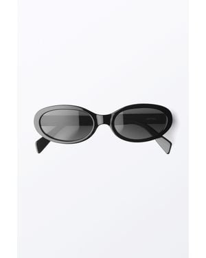 Monki Slim Oval Tinted Sunglasses - Black