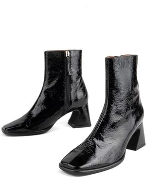 INTENTIONALLY ______ Taffy Patent Leather Heeled Boot - Black
