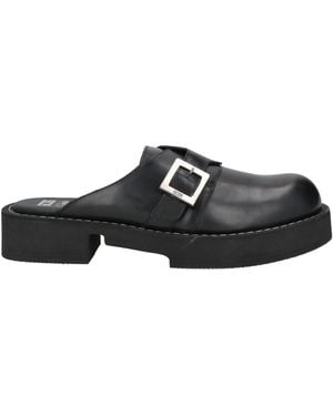 GCDS x CLARKS Mules & Clogs - Schwarz