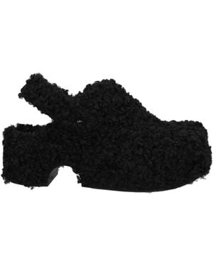 XOCOI Mules & Clogs - Schwarz