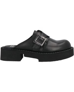 GCDS x CLARKS Mules & Clogs - Schwarz