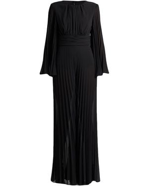 COUTURE IS FOREVER Jumpsuits - Black